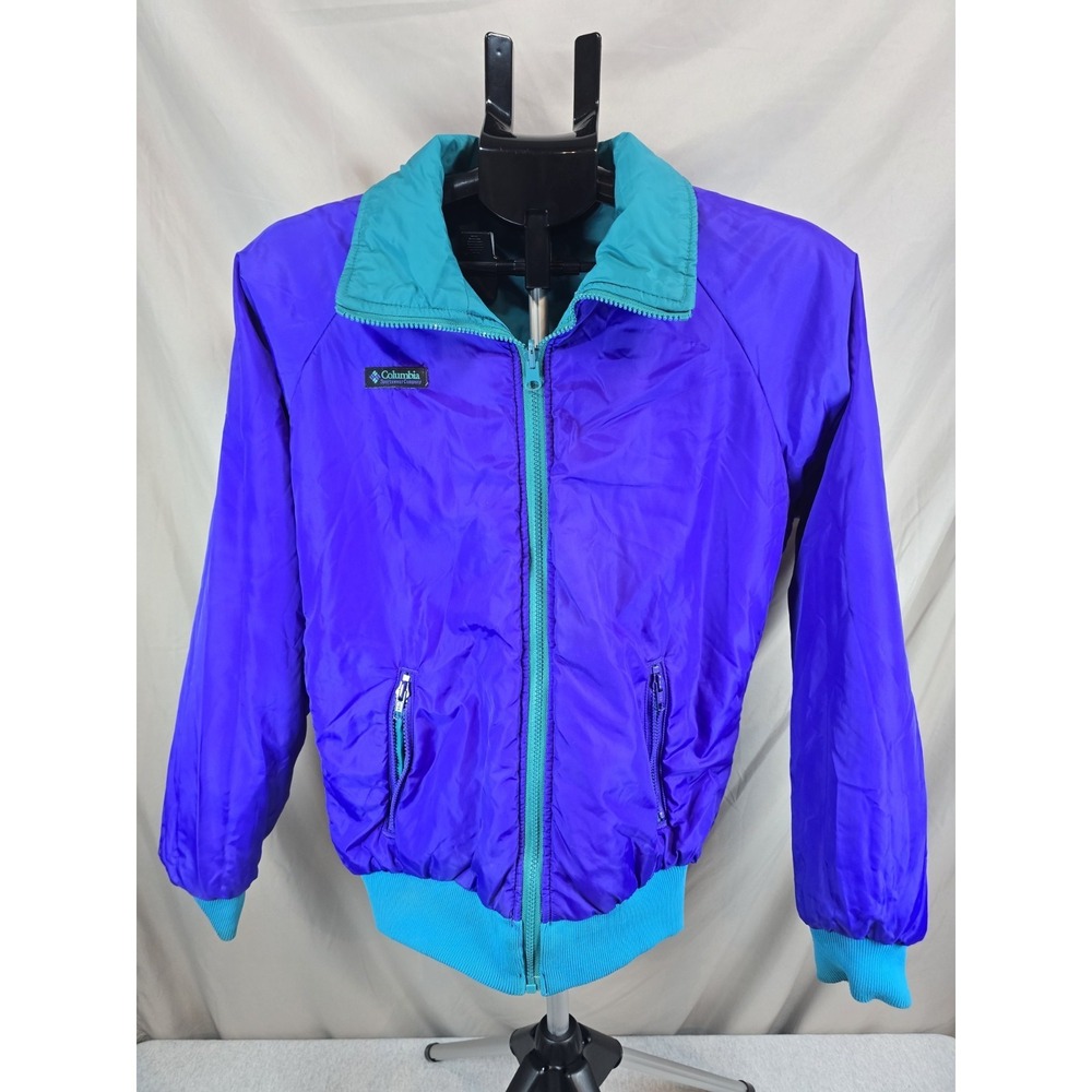 vintage Columbia reversible ski jacket featuring a vibrant purple and teal color